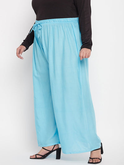 Sky blue solid rayon palazzo with elastic waistband and drawstring.