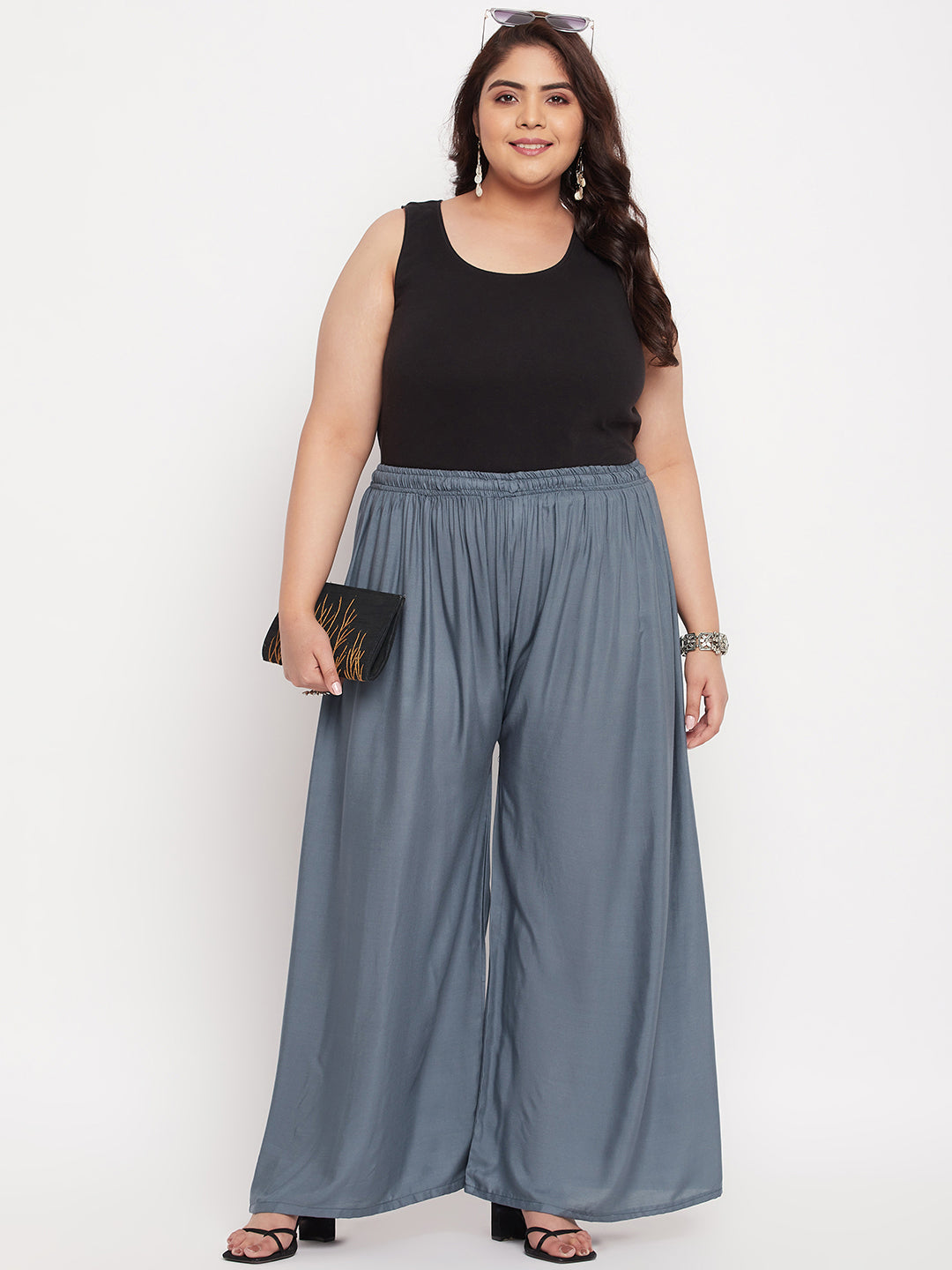 Grey solid rayon palazzo with elasticated waistband and drawstring.
