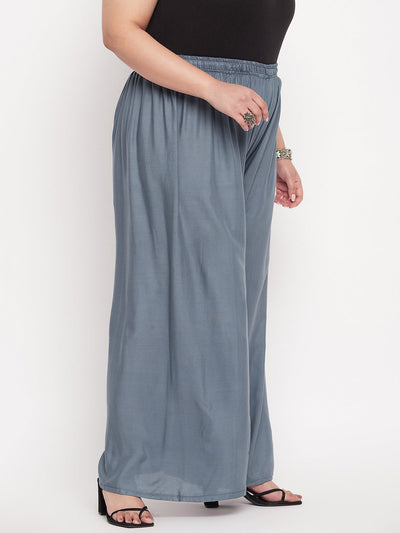 Grey solid rayon palazzo with elasticated waistband and drawstring.