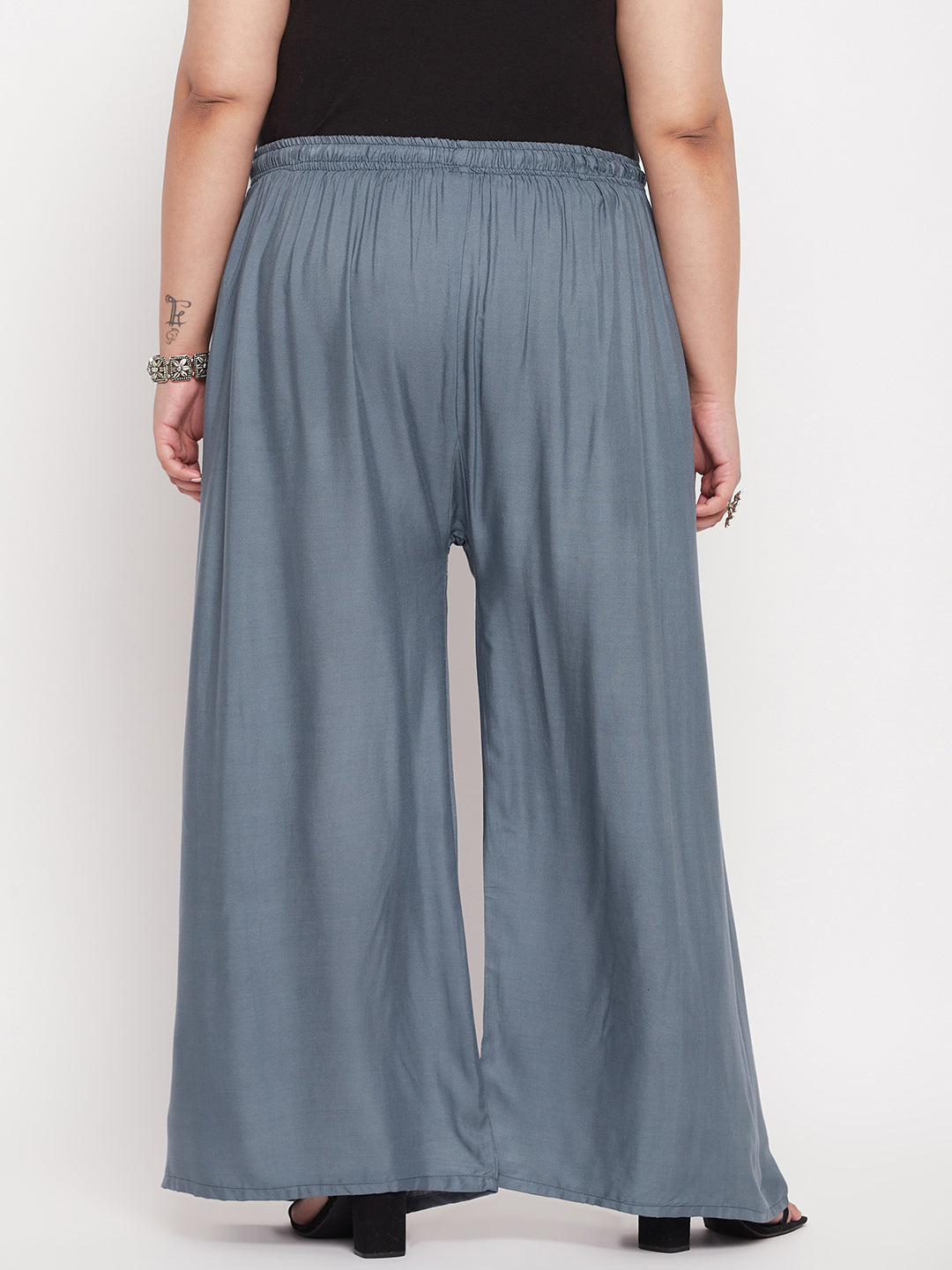 Grey solid rayon palazzo with elasticated waistband.