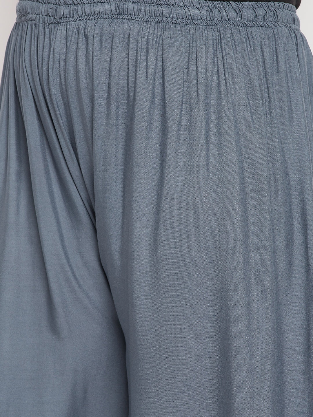 Grey solid rayon palazzo with elasticated waistband and drawstring.