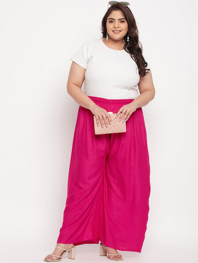 Magenta solid rayon palazzo with elasticated waistband and drawstring.