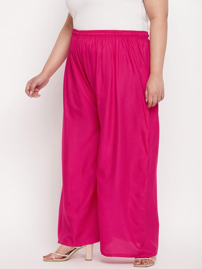 Magenta solid rayon palazzo with elasticated waistband and drawstring.