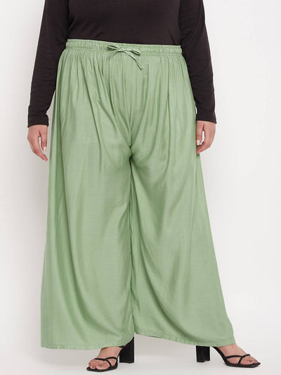 Pista Green Solid Rayon Palazzo with elasticated waistband and drawstring.