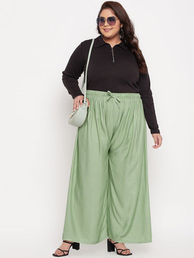 Pista Green Solid Rayon Palazzo with elasticated waistband and drawstring.
