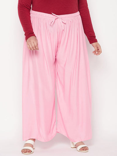 Baby Pink Solid Rayon Palazzo with elasticated waistband and drawstring.