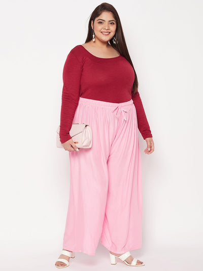 Baby Pink Solid Rayon Palazzo with elasticated waistband and drawstring.