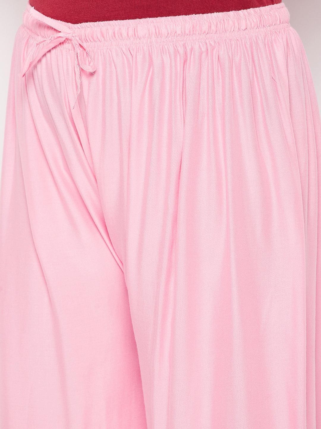 Baby Pink Solid Rayon Palazzo with elasticated waistband and drawstring.