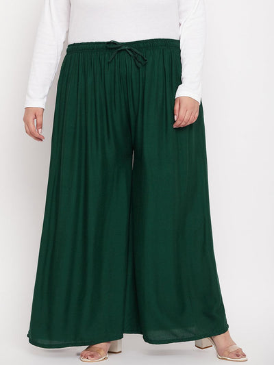 Bottle Green Solid Rayon Jumbo Sharara with elasticated waistband and drawstring.