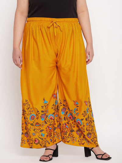 Mustard printed rayon palazzo with floral design and elasticated waistband.