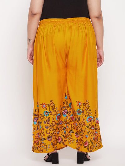 Mustard printed rayon palazzo with elasticated waistband and drawstring.