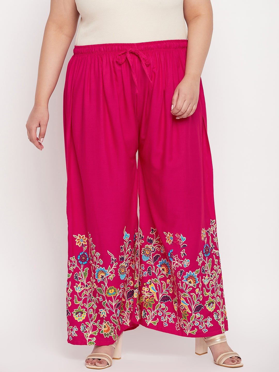 Magenta printed rayon palazzo with floral design and elasticated waistband.