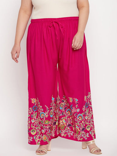Magenta printed rayon palazzo with floral design and elasticated waistband.