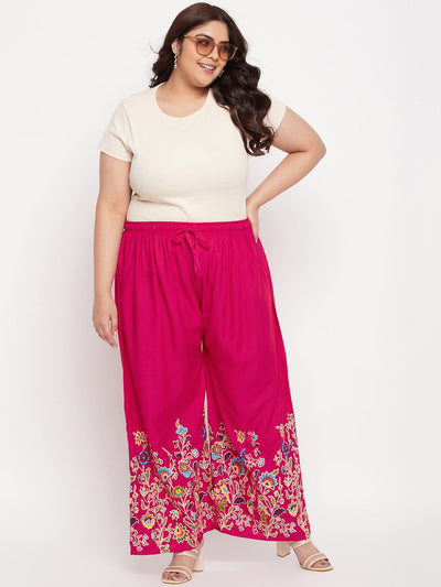 Magenta printed rayon palazzo with elasticated waistband and drawstring.