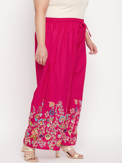 Magenta printed rayon palazzo with floral design and elasticated waistband.