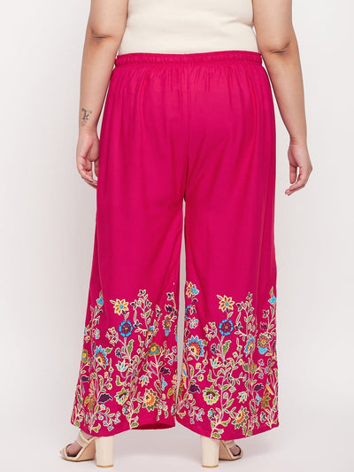 Magenta printed rayon palazzo with elasticated waistband and floral design.