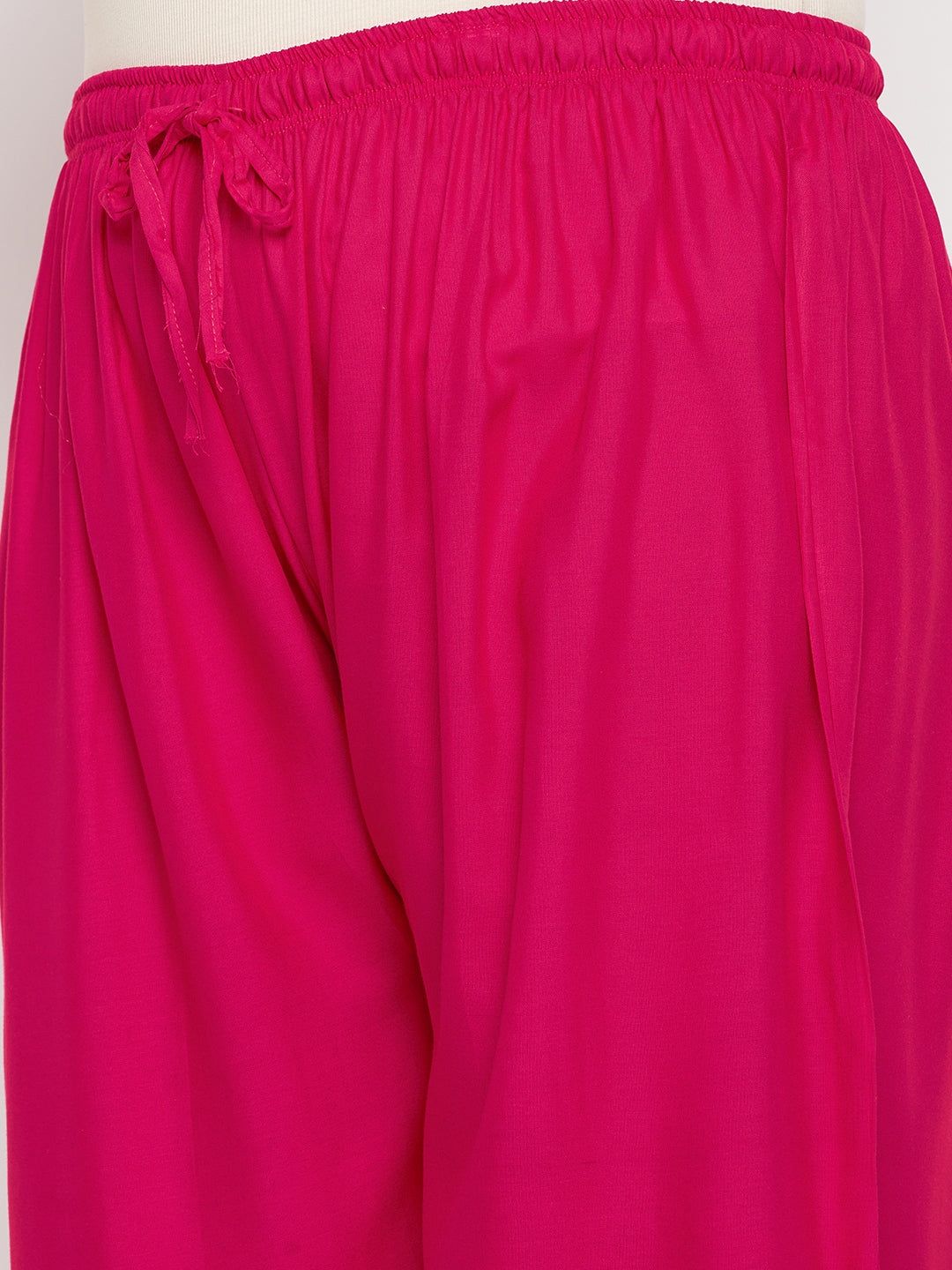 Magenta printed rayon palazzo with elasticated waistband and drawstring.
