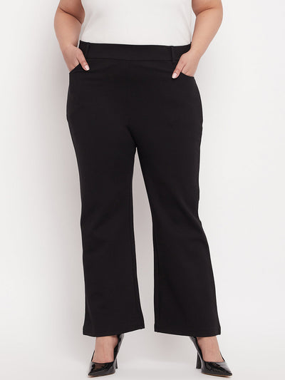 Black solid bootcut jegging made from NR Roma fabric for style and comfort.