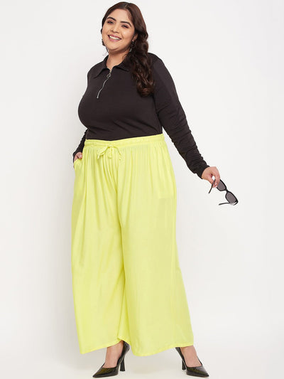 Lemon solid rayon jumbo sharara with elasticated waistband and drawstring.