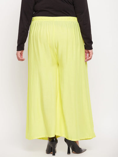 Lemon solid rayon jumbo sharara with elasticated waistband and drawstring.