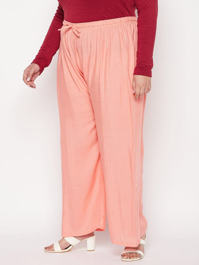 Dark Peach Solid Rayon Palazzo with elasticated waistband and drawstring.