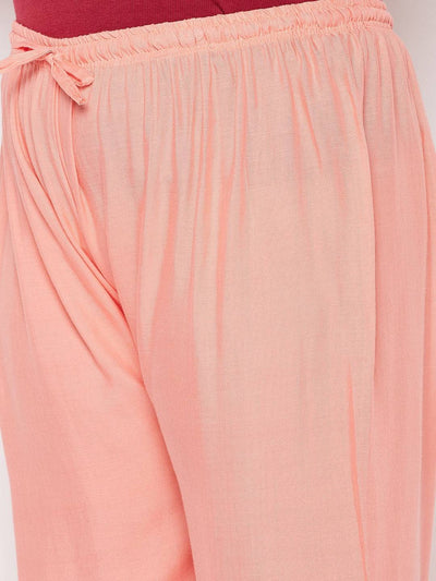 Dark Peach Solid Rayon Palazzo with elasticated waistband and drawstring.
