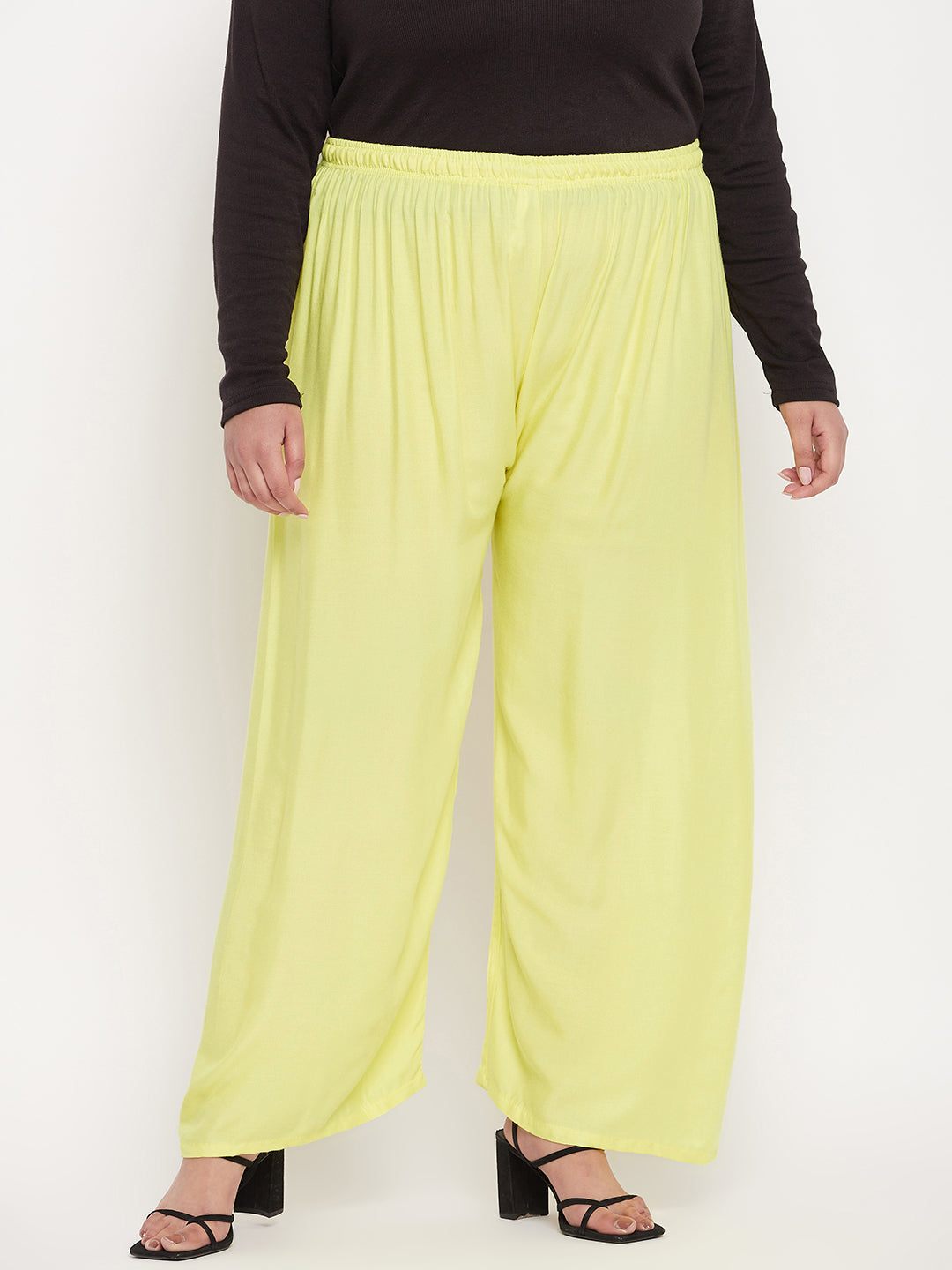 Lemon solid rayon palazzo with elasticated waistband and drawstring.
