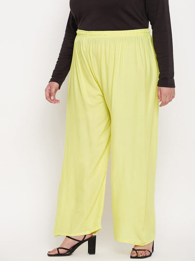 Lemon solid rayon palazzo with elasticated waistband and drawstring.