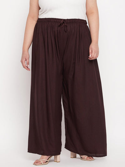 Coffee solid rayon palazzo with elasticated waistband and drawstring.