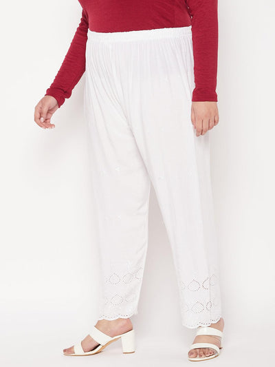 White embroidered Chikankari rayon palazzo with elasticated waistband.