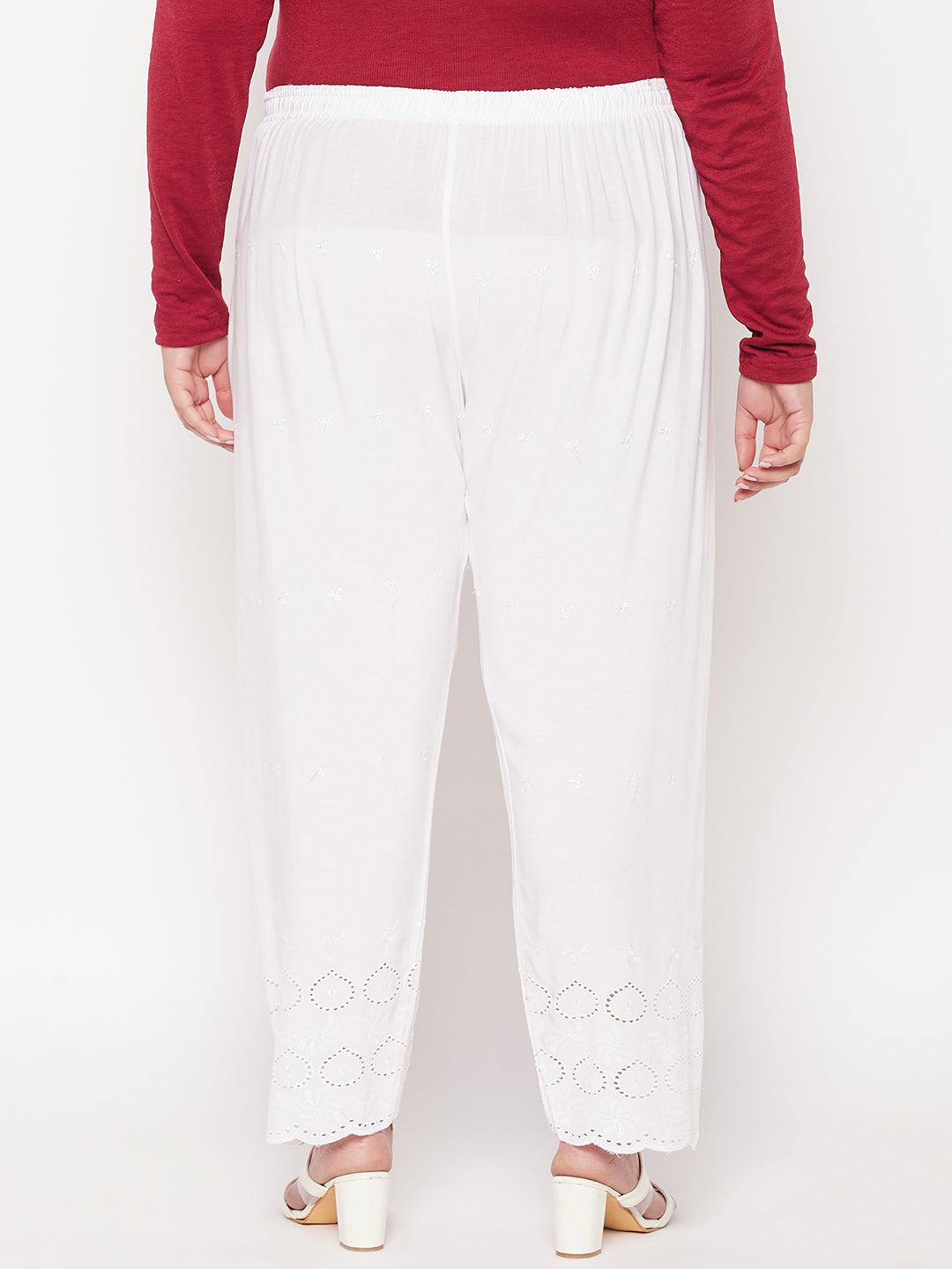 White embroidered Chikankari rayon palazzo with elasticated waistband and drawstring.