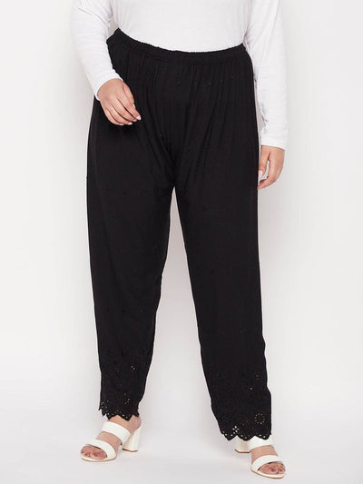 Black embroidered chikankari rayon palazzo with elasticated waistband and drawstring.