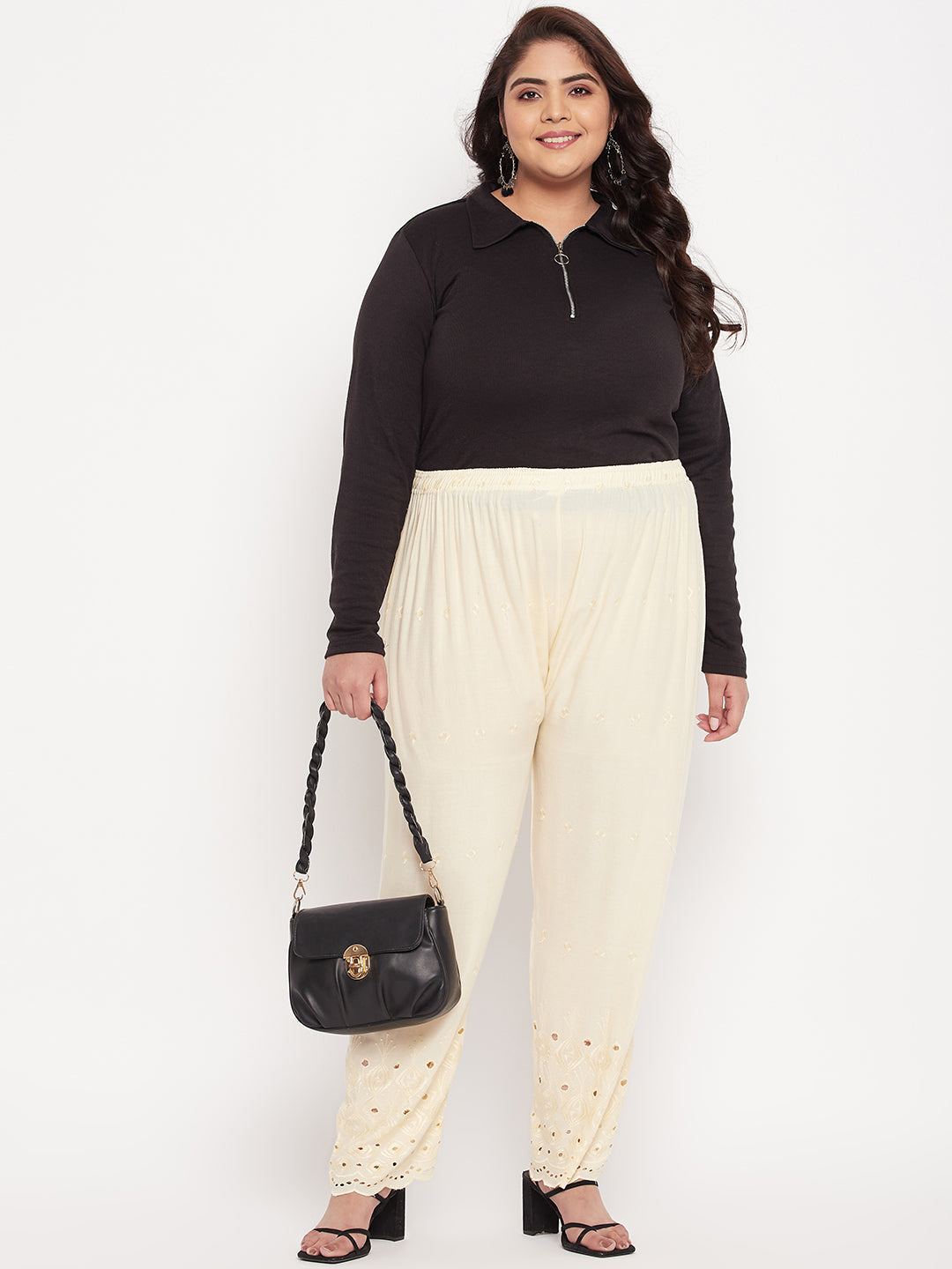 Cream embroidered chikankari rayon palazzo with elasticated waistband.