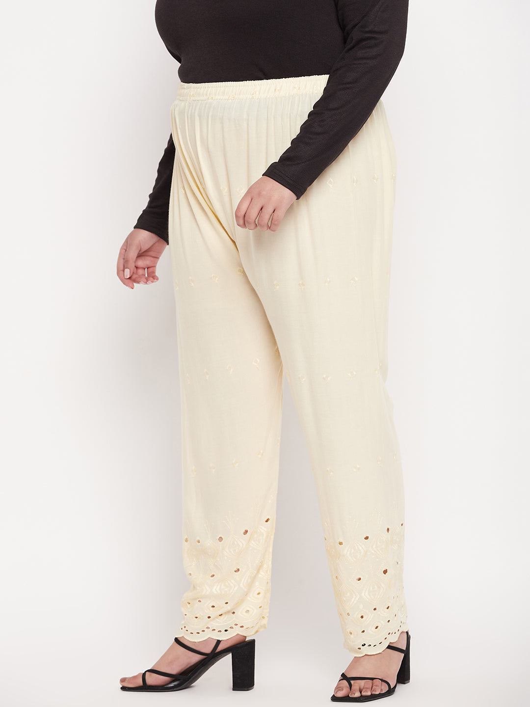 Cream embroidered Chikankari rayon palazzo with elasticated waistband and drawstring.