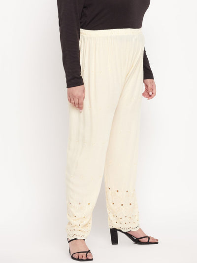 Cream embroidered Chikankari rayon palazzo with elasticated waistband and drawstring.