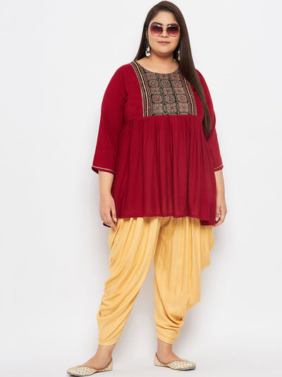 Fawn solid rayon dhoti salwar with elasticated waistband and drawstring.