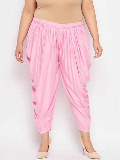 Baby pink solid rayon dhoti salwar with elasticated waistband and drawstring.