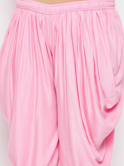 Baby pink solid rayon dhoti salwar with elasticated waistband and drawstring.