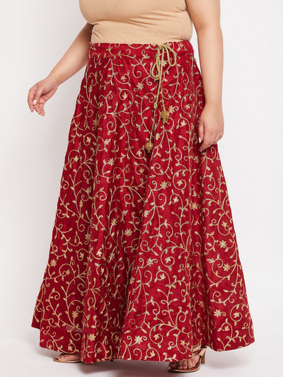 Maroon and gold embroidered flared skirt with drawstring waistband.
