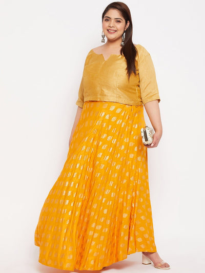 Mustard printed flared rayon skirt with drawstring waistband.