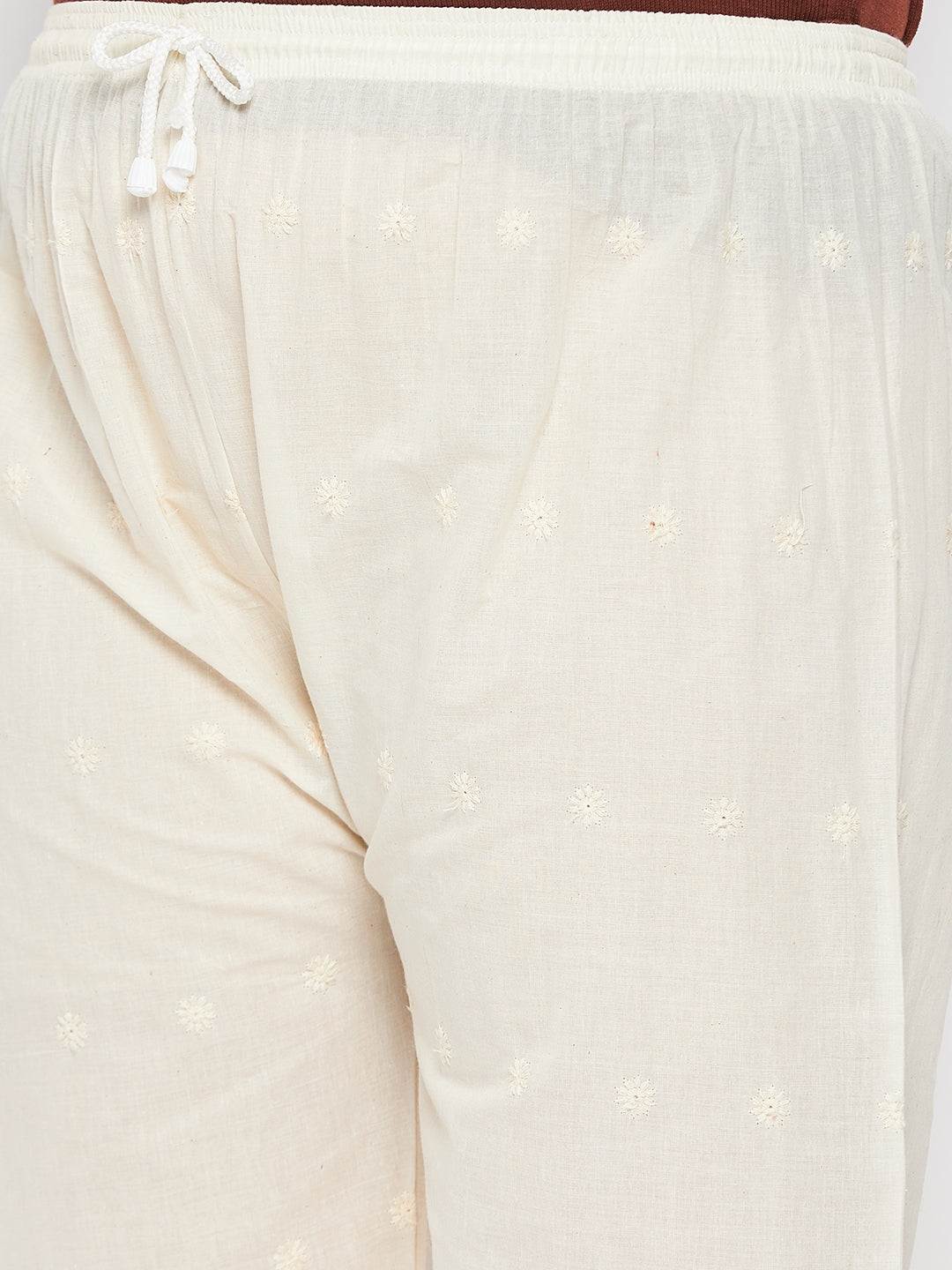 Cream Chikankari cotton palazzo with embroidered design and elastic waistband.