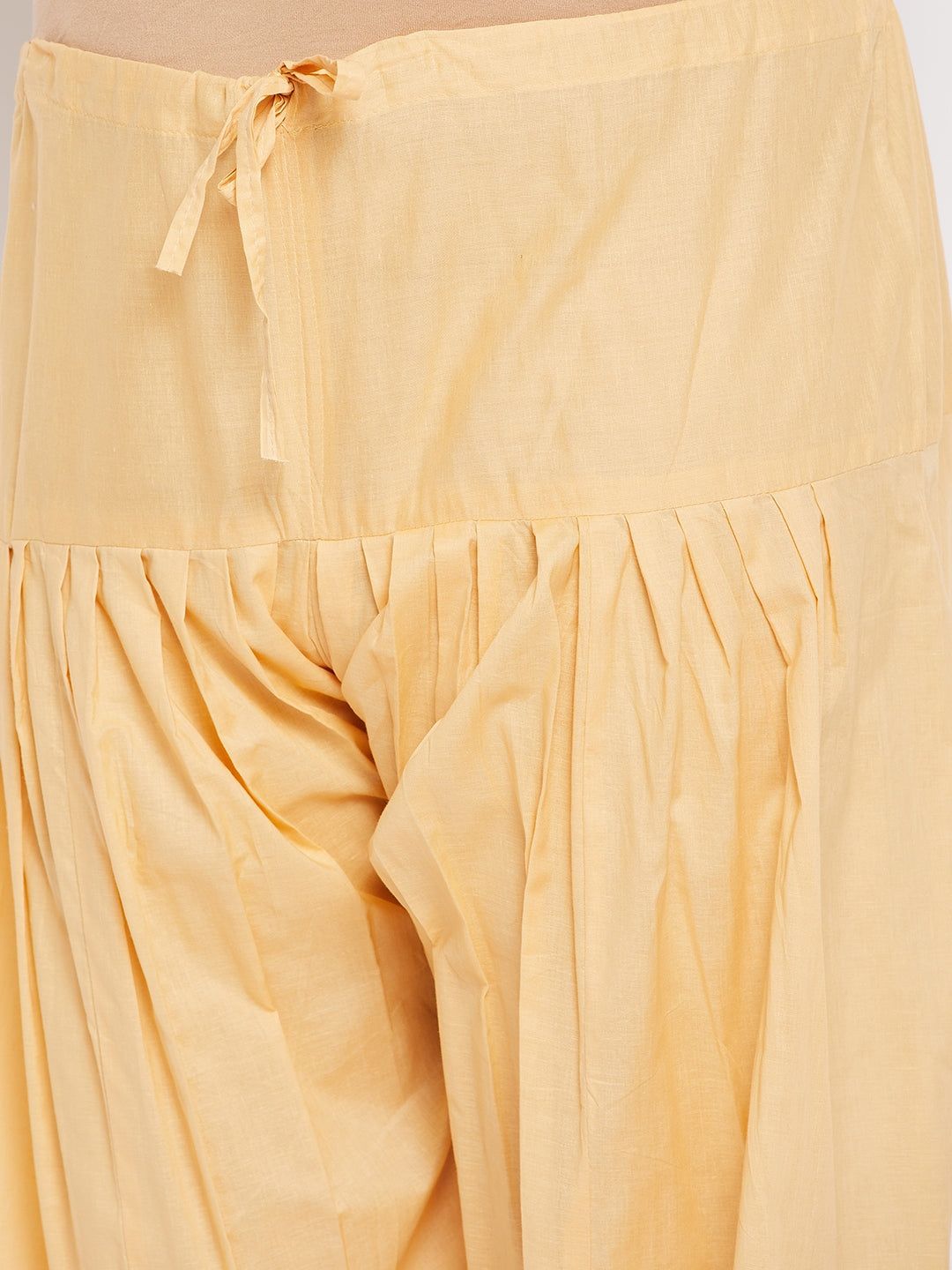Fawn solid semi Patiala cotton salwar with drawstring waistband.