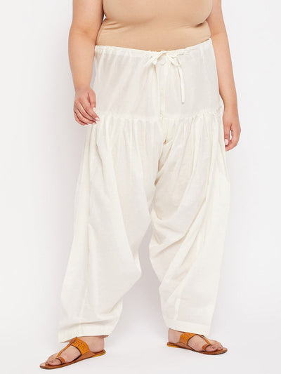 Cream solid semi Patiala cotton salwar with drawstring waistband.