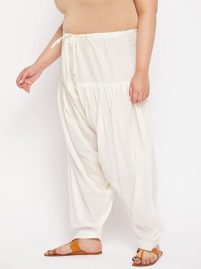 Cream solid semi Patiala cotton salwar with drawstring waistband.