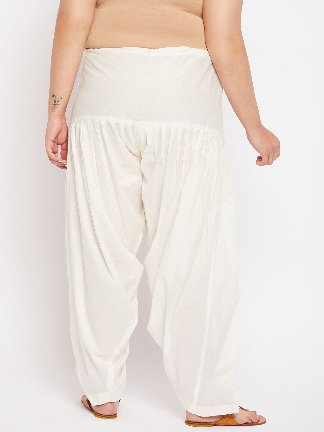 Cream solid semi Patiala cotton salwar with drawstring waistband.
