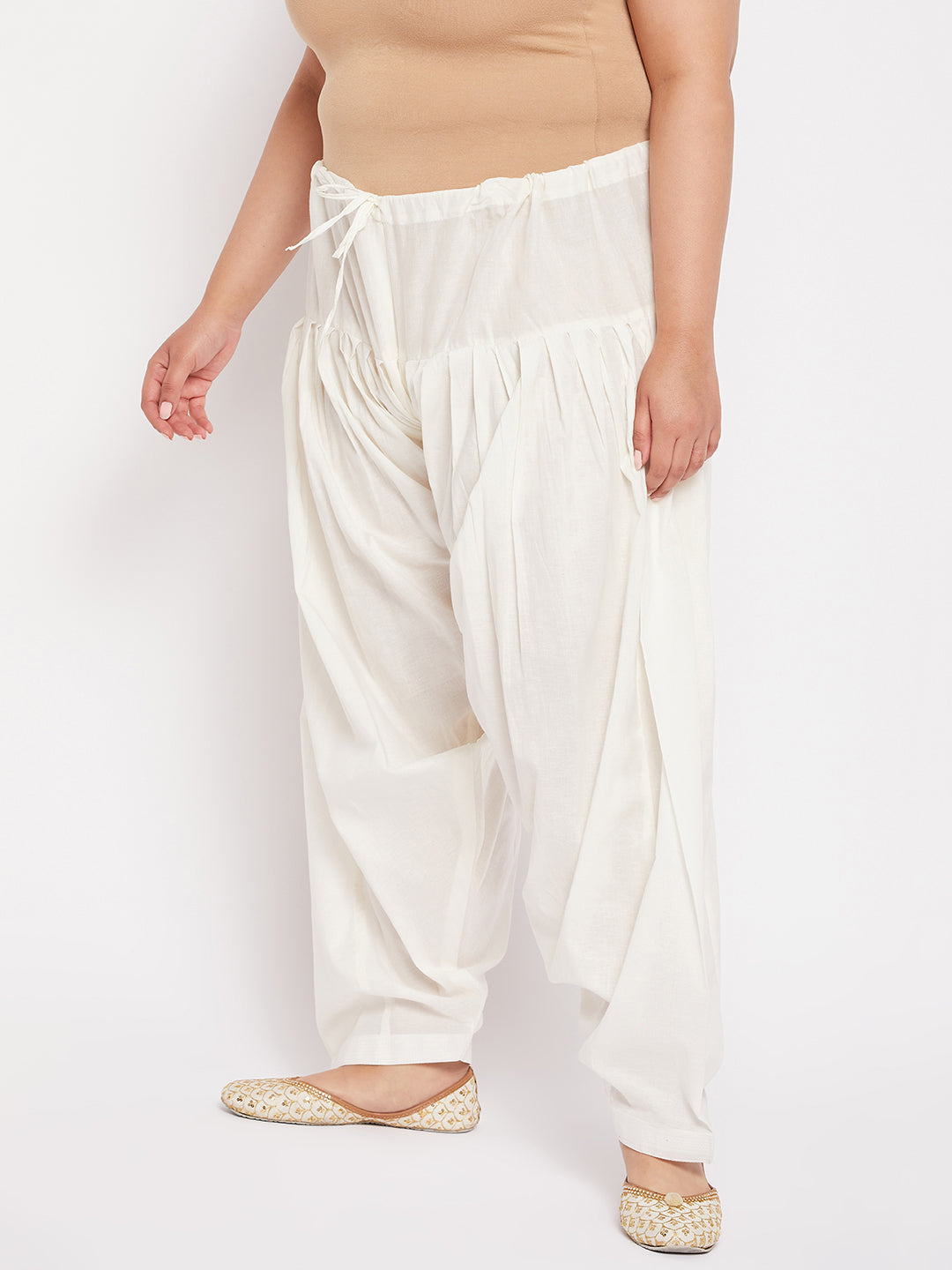 Cream solid full Patiala cotton salwar with drawstring waistband.