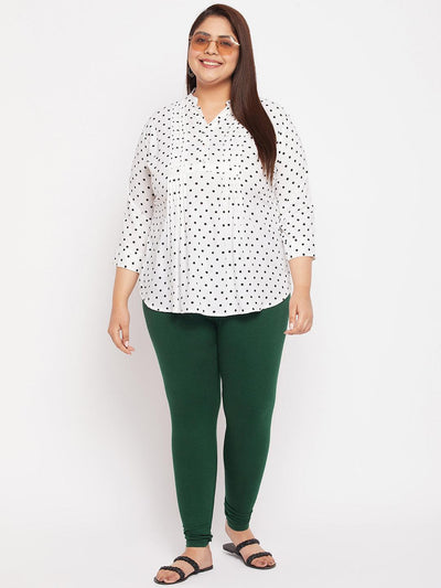 Bottle green solid ankle length leggings with elasticated waistband.