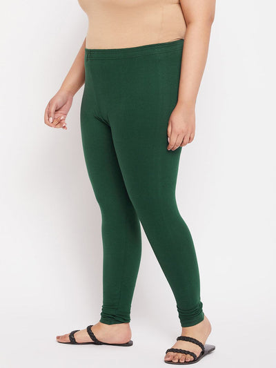 Bottle Green Solid Ankle Length Leggings with elastic waistband.