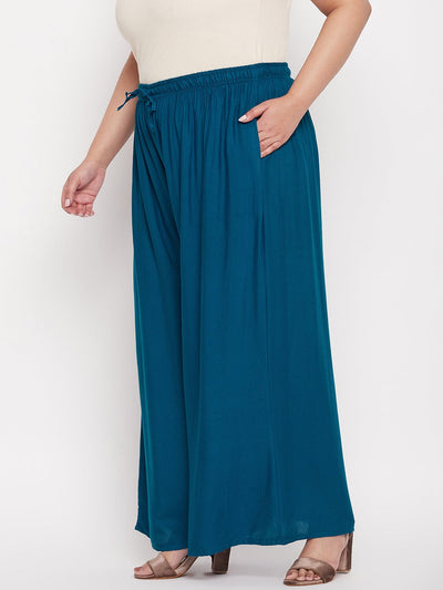 Aqua Blue Solid Rayon Jumbo Sharara with elasticated waistband and drawstring.