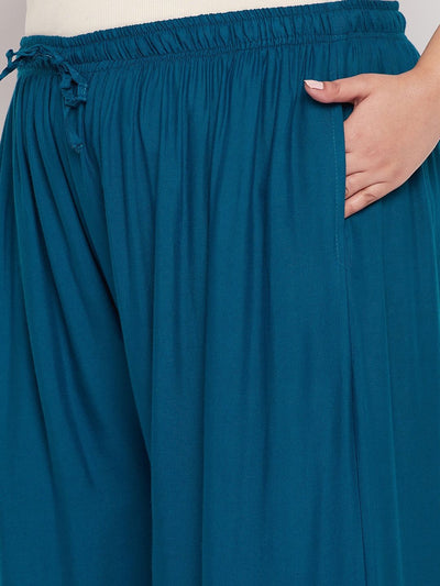 Aqua Blue Solid Rayon Jumbo Sharara with elasticated waistband and drawstring.